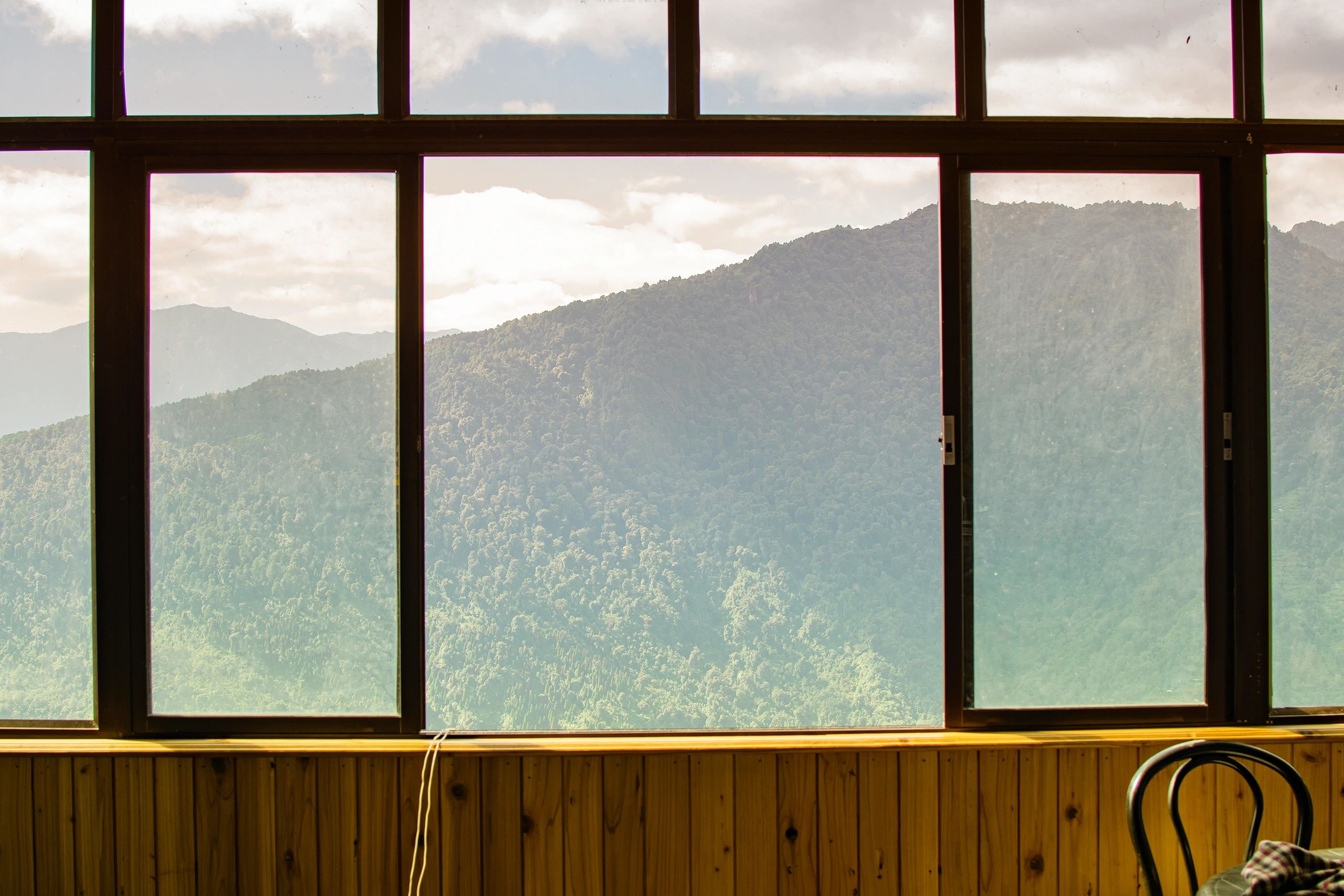 View of Himalayan mountains through a window